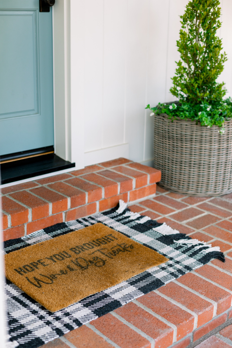 Black and white rug and layered doormat