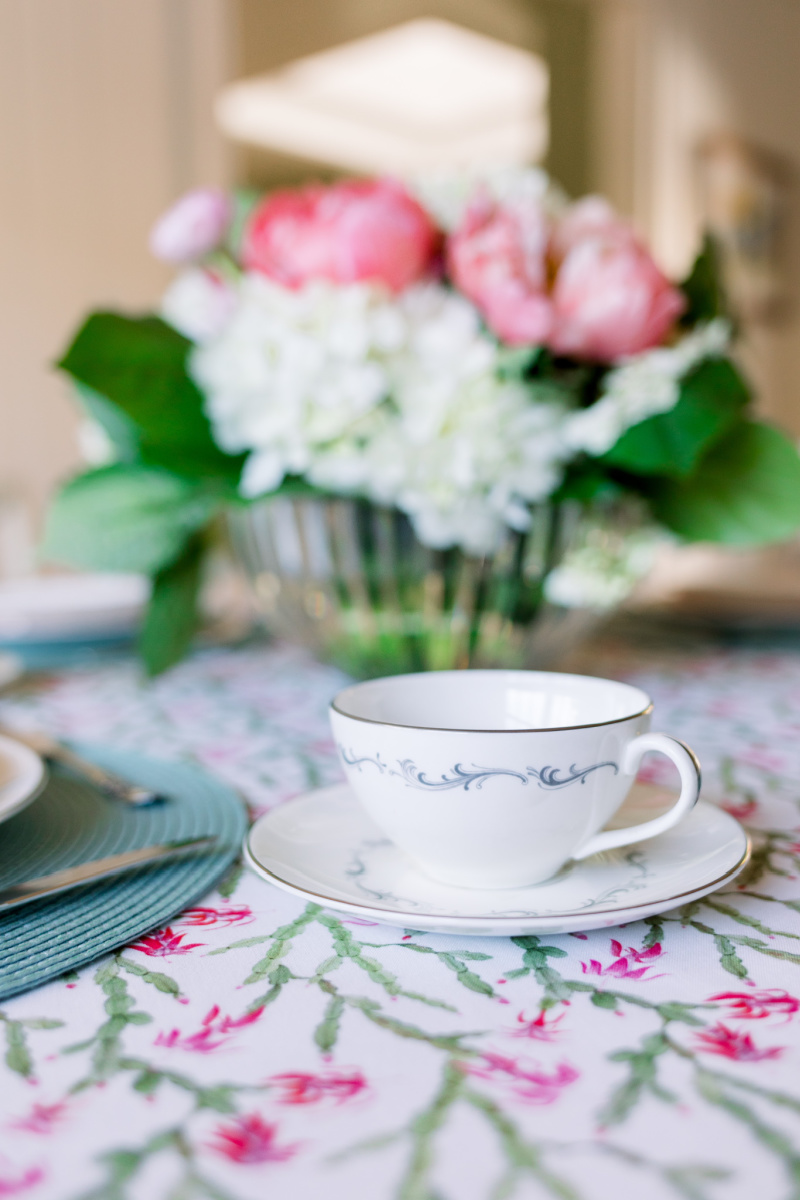 Floral arrangement and tea cup