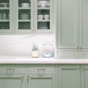 Sage Kitchen Cabinets with Glass Fronts