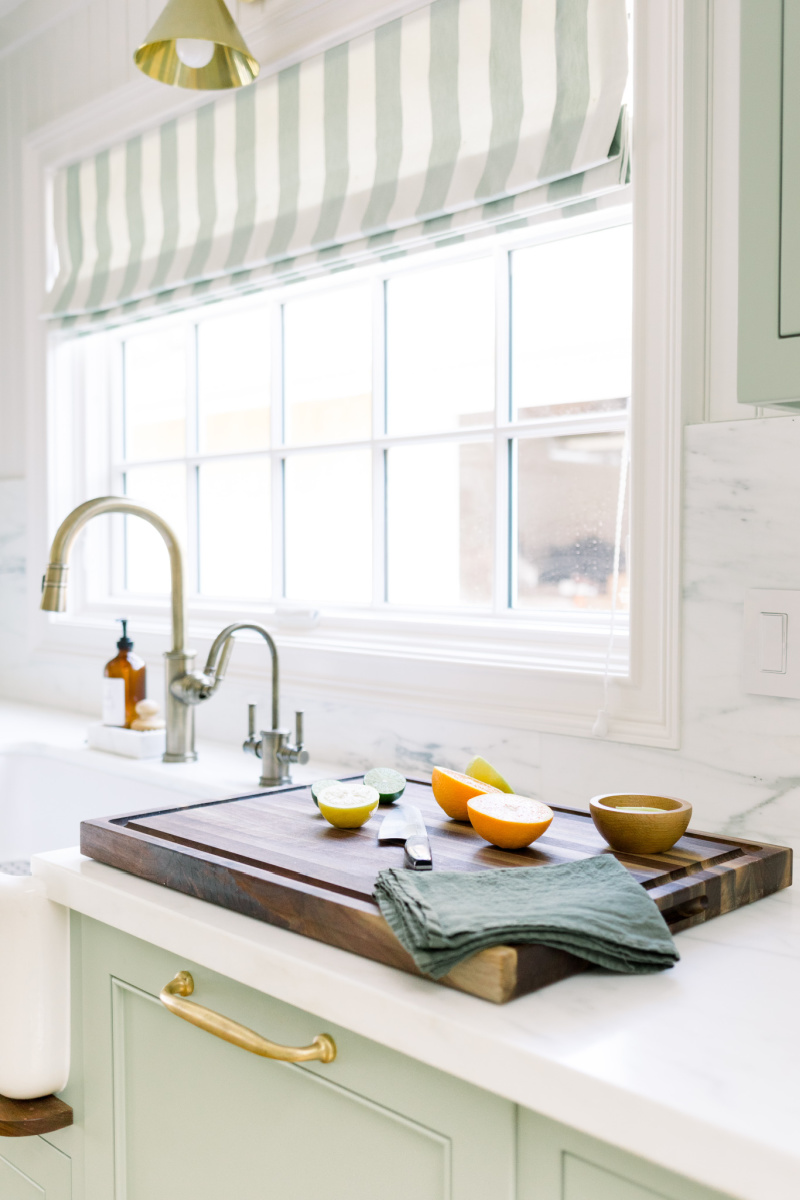 Kitchen faucet and cutting board