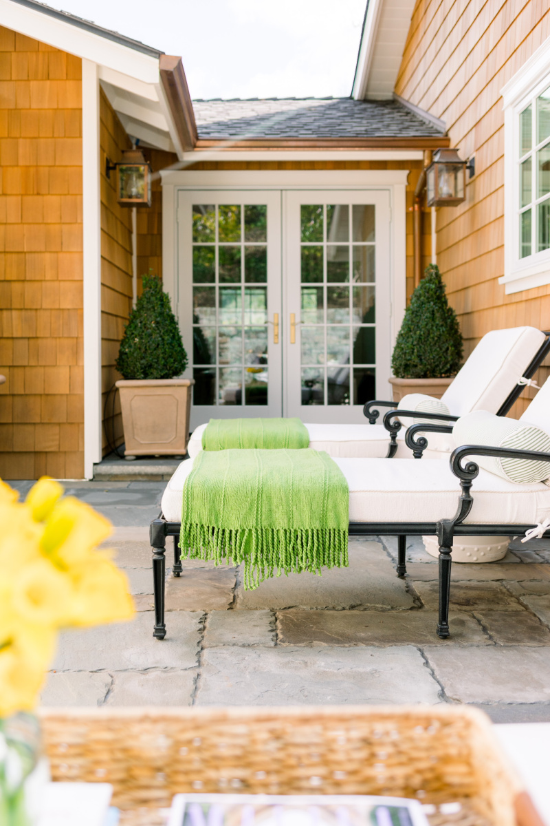Outdoor patio with boxwood topiary