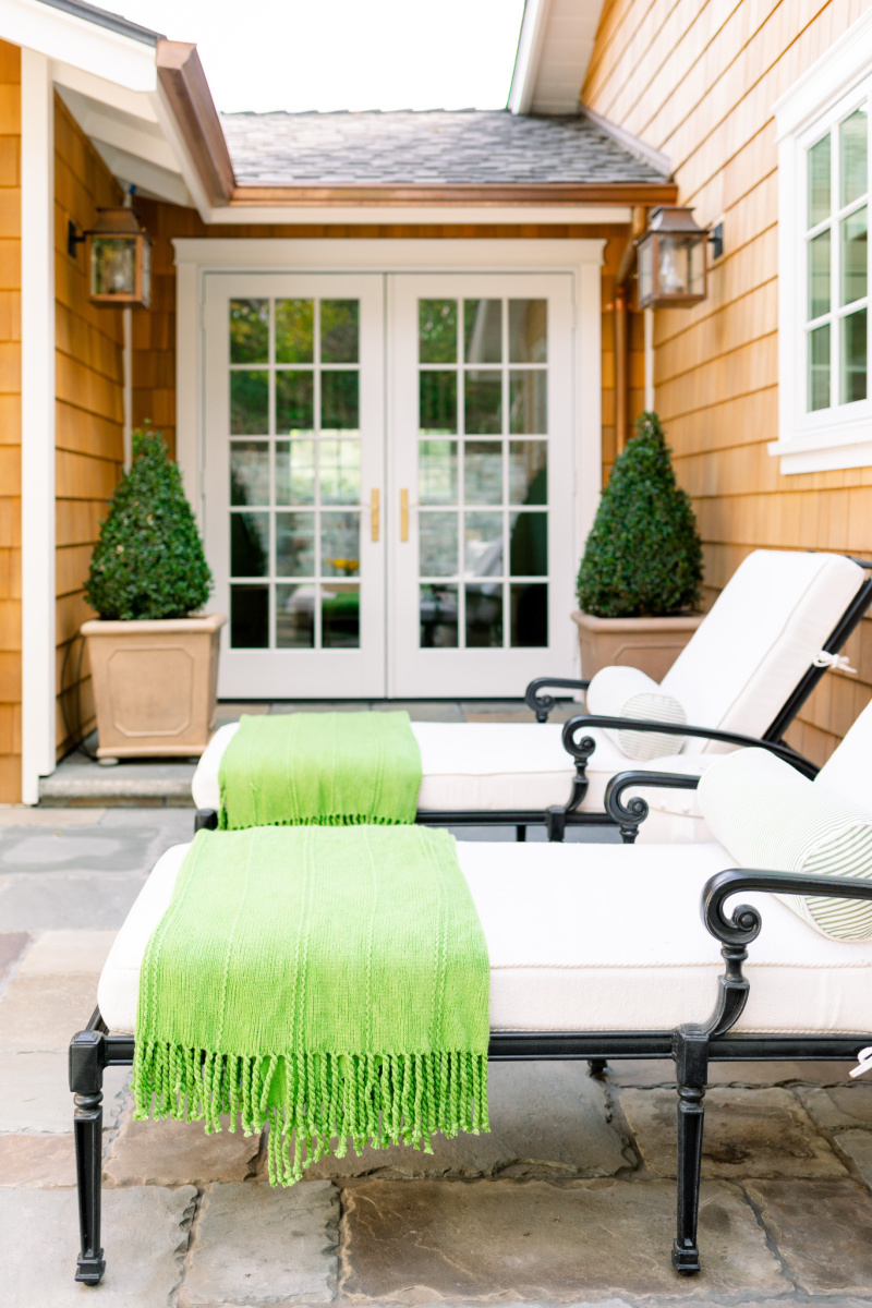 Patio Chaise Lounges and Boxwood Topiaries