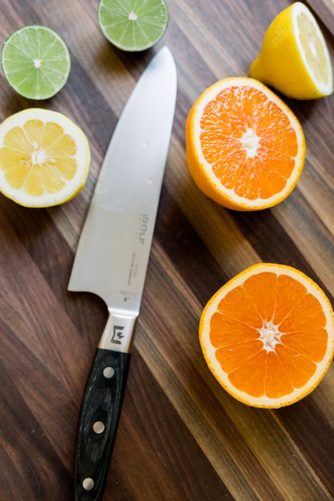 Cutting Citrus on cutting board