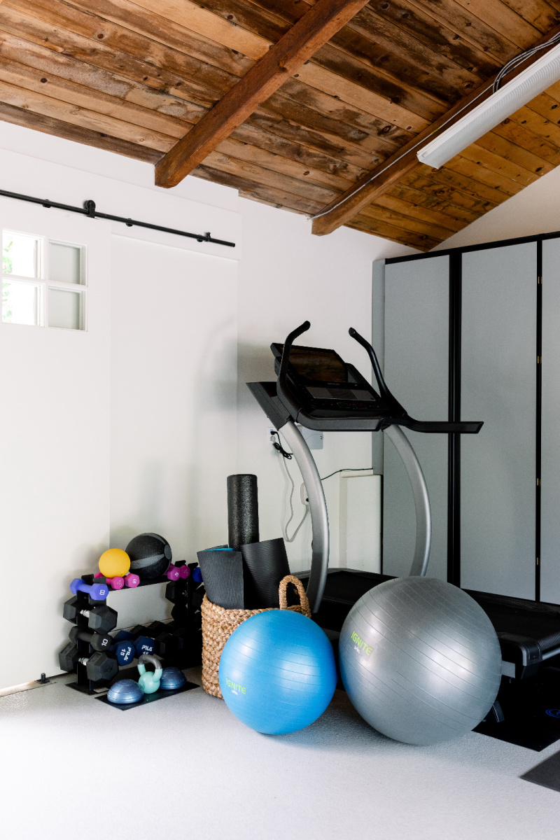 Treadmill and home gym in the garage