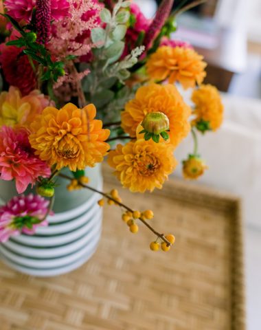 Floral arrangement on rattan table