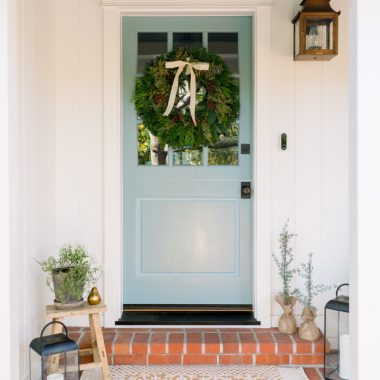 Blue Dutch Door with holiday wreath