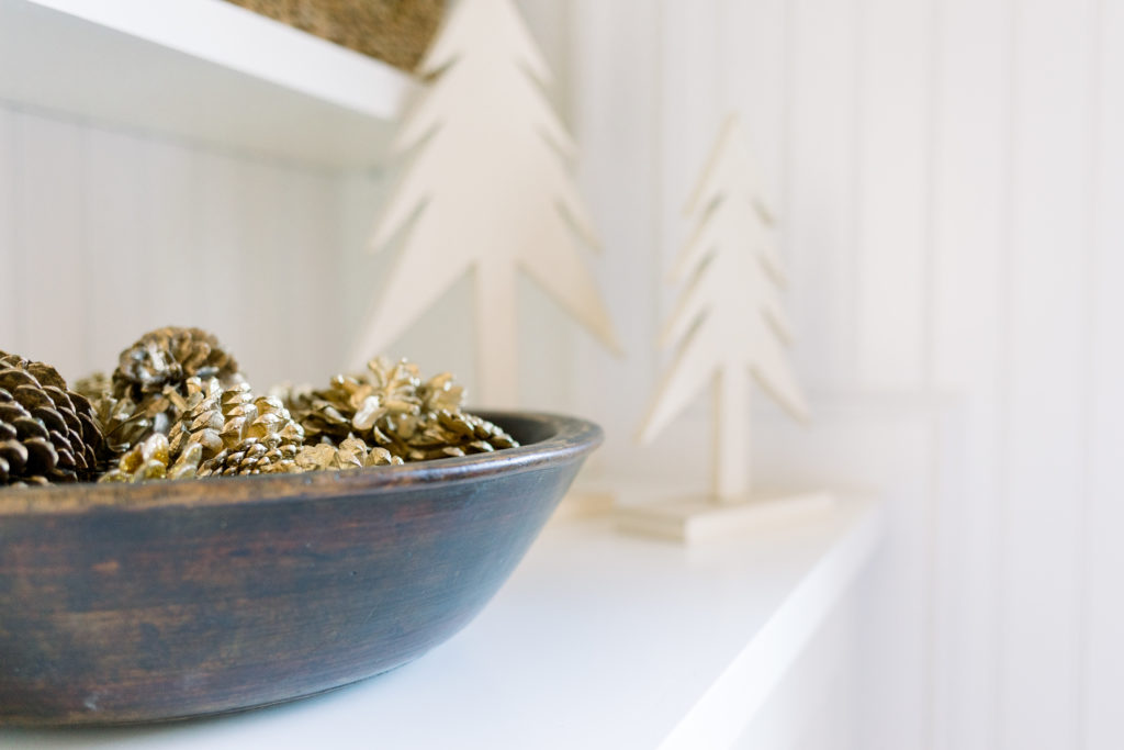 Gold pine cones and wood Christmas Trees