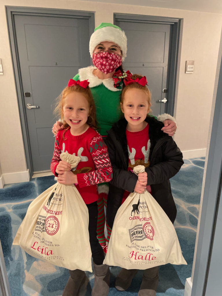 Twin girls with Christmas Elf