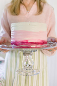 Woman holding Valentine Cake
