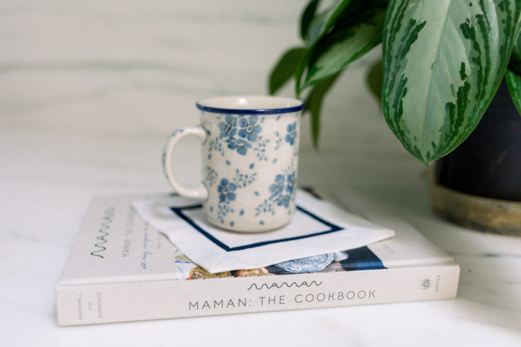 Maman Cookbook and Mug of Tea