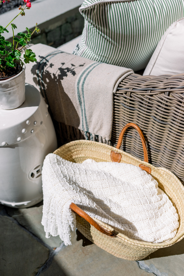 Outdoor garden stool and basket vignette