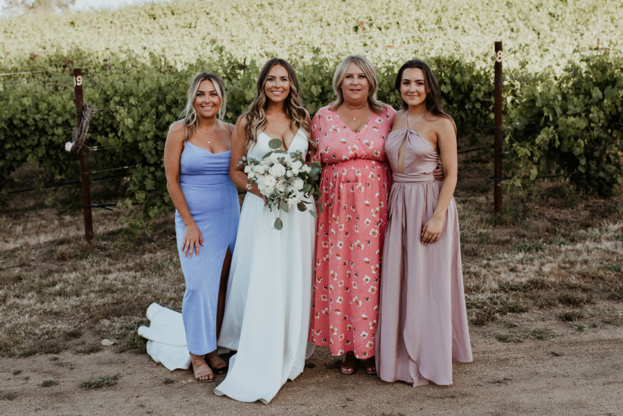 Mom and daughters at wedding