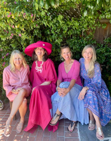 Four ladies in pink on patio