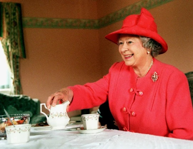 Queen taking tea.