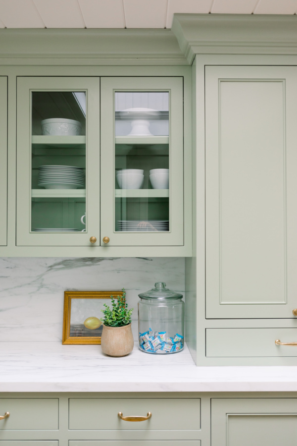 Green kitchen cabinets painted Farrow & Ball Vert de Terre.