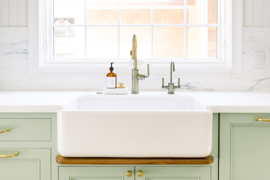 Kitchen Sink with green cabinets painted Vert de Terre.
