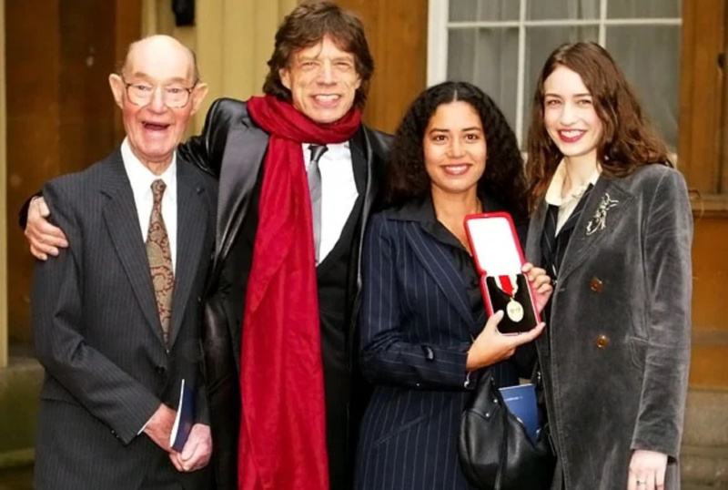 Mick Jagger and family after being knighted.