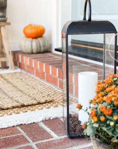 Fall front porch vignette with anthropology lanterns.
