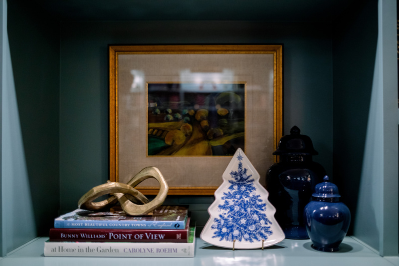 Blue and White Christmas tree plate on a stand.