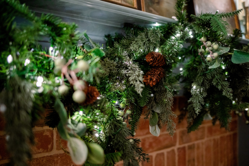Garland over fireplace.