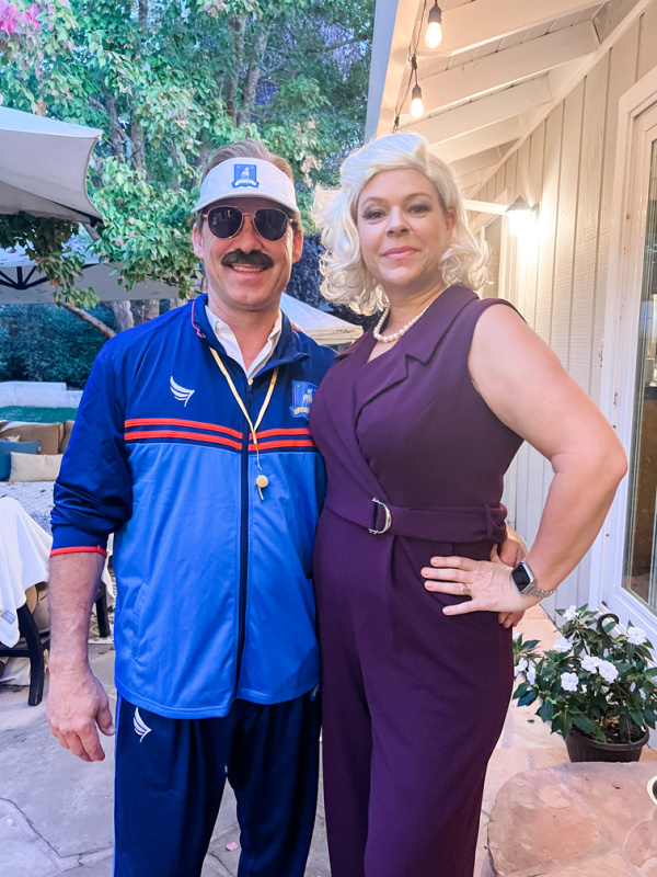 Couple dressed as Ted Lasso cast for Halloween.