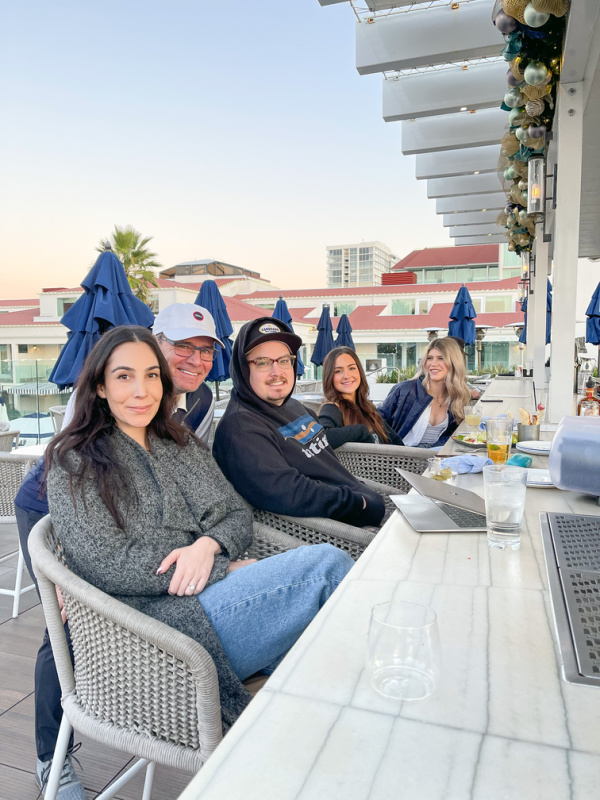 Family seated at outdoor bar in Coronado.