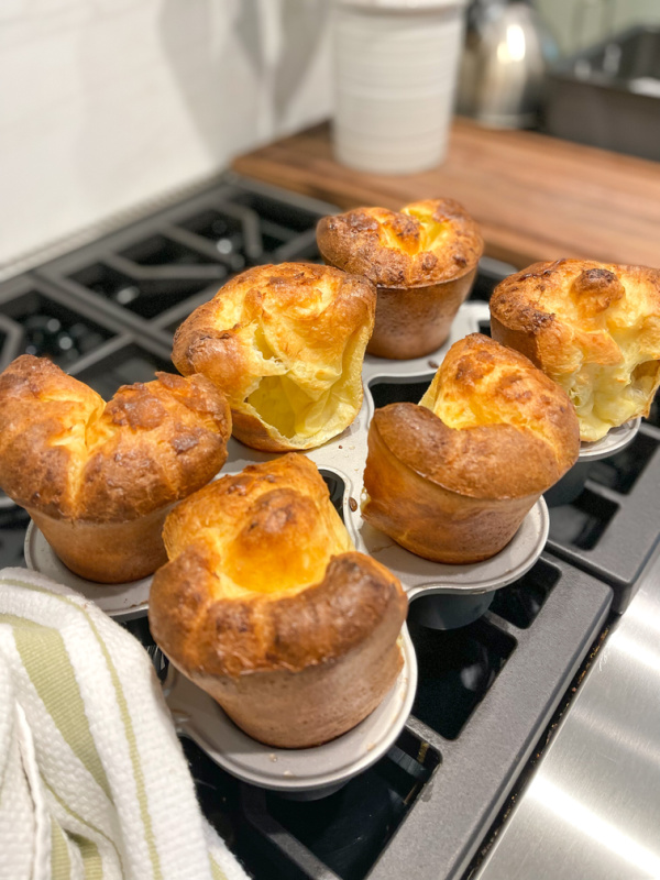 Pan of popovers on stovetop.