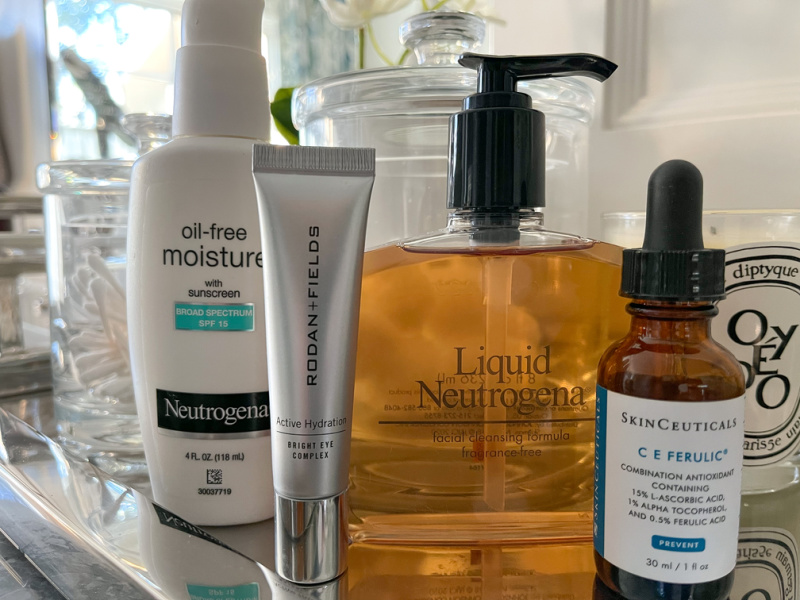 Morning skin care routine products on vanity tray.