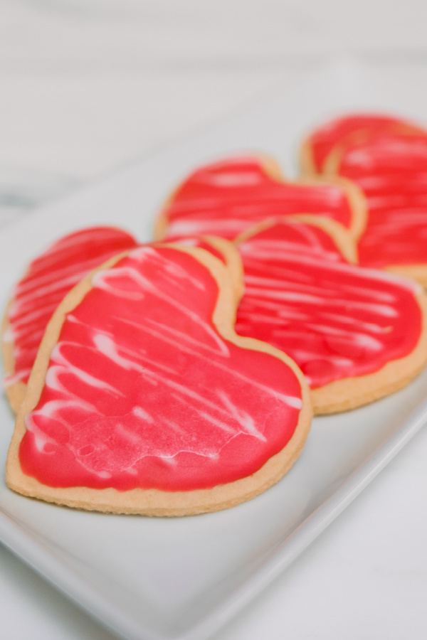 Heart shaped pink Valentine's Day cookies.