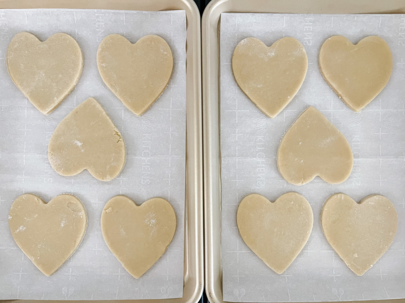 Heart shaped cookies on cookie sheet.