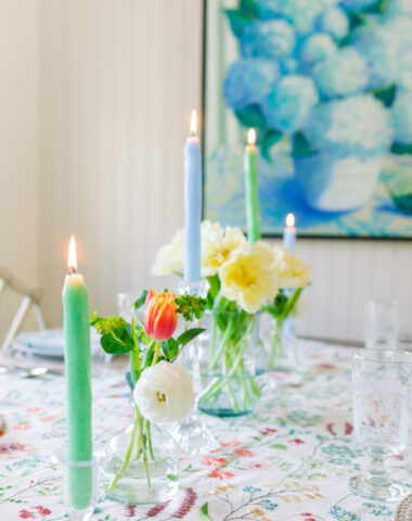 Spring table with flowers and candles.