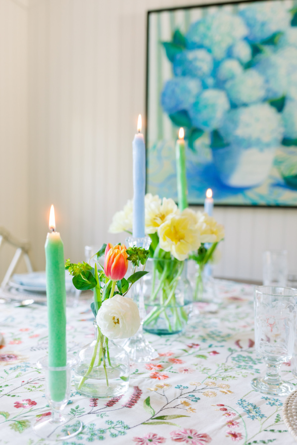 Spring table with flowers and candles.