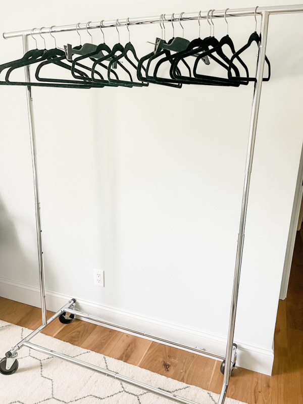 Empty rolling clothes rack.
