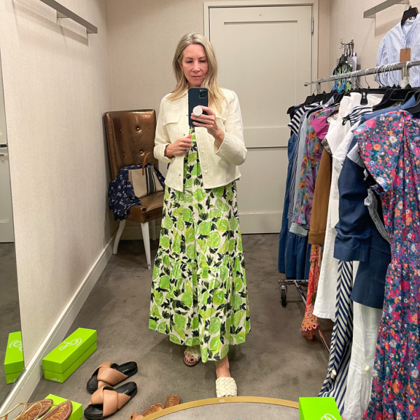 Woman wearing Steve Madden lime dress in Nordstrom dressing room.