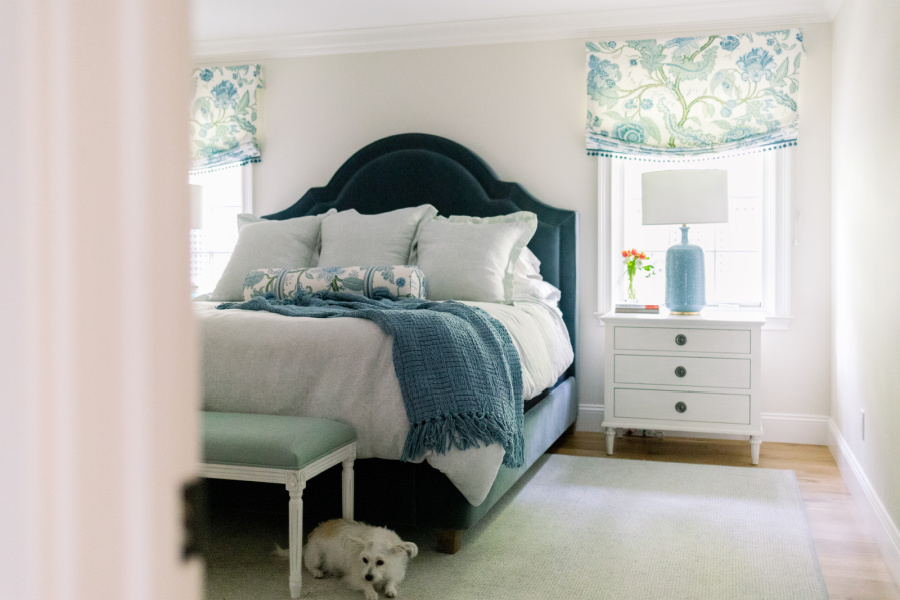 Main bedroom decorated in blue and white.