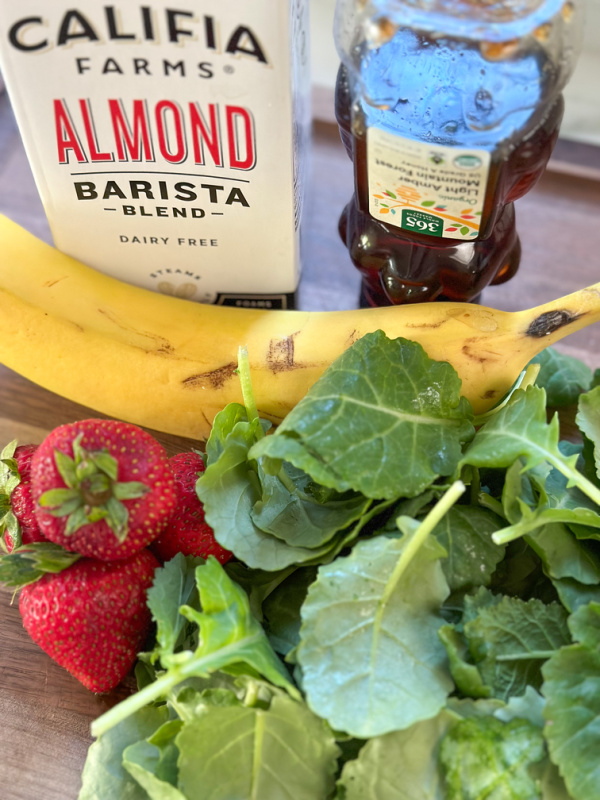 Ingredients for kale strawberry smoothie.