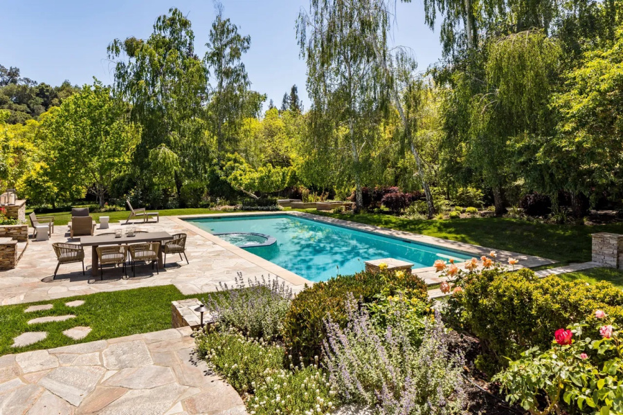 Beautiful outdoor rectangular pool and patio.
