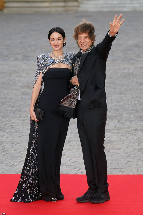 Melanie Hamrick and Mick Jagger on the red carpet at Versaille