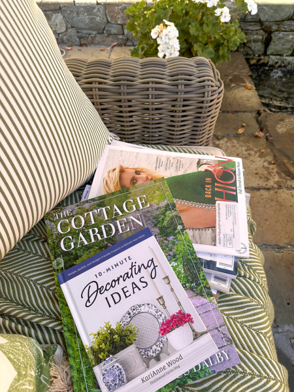 Magazines and books on outdoor sofa.