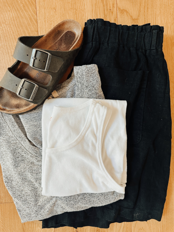 Road trip outfit flat lay.