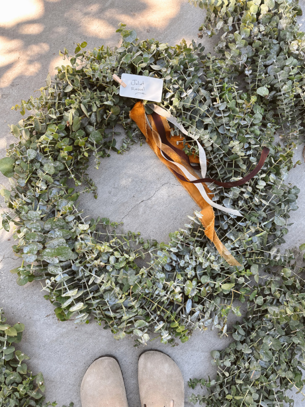 Eucalyptus wreath with velvet ribbons from Branches & Bloom.