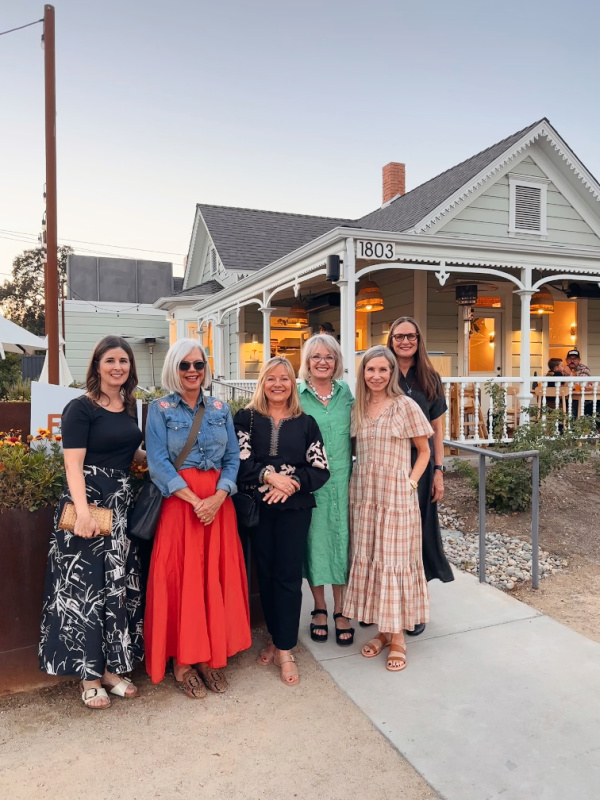 Group of six woman standing outside Finca restaurant in Paso Robles.