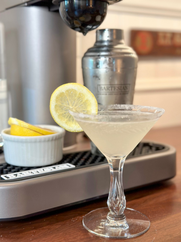 Lemon Drop Martini next to Bartesian Cocktail Maker.