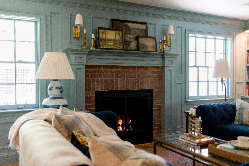Traditional home library room painted Oval Room blue.