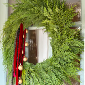 Holiday wreath on front door.