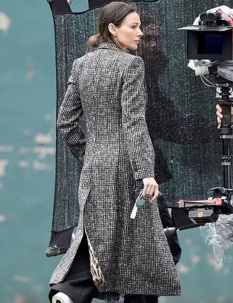 Fool Me Once main character, Maya Stern, wearing tweed coat.