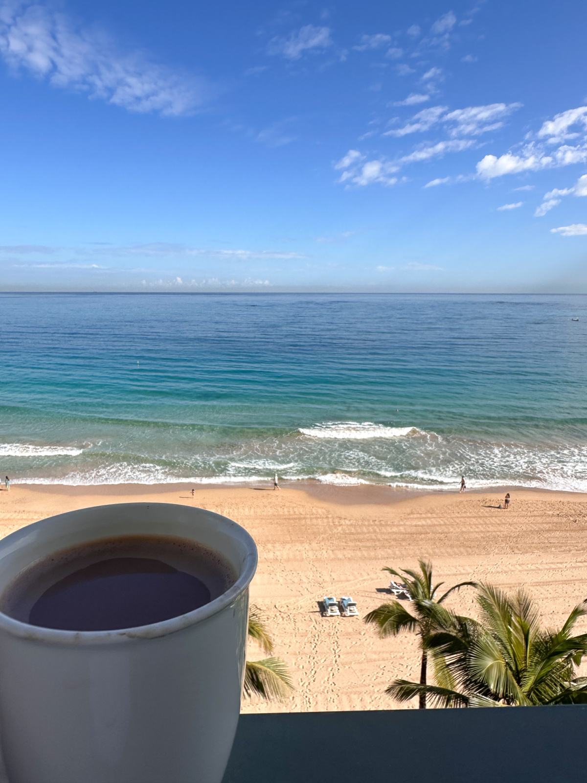 Cocoa cup over San Juan Puerto Rico beach.