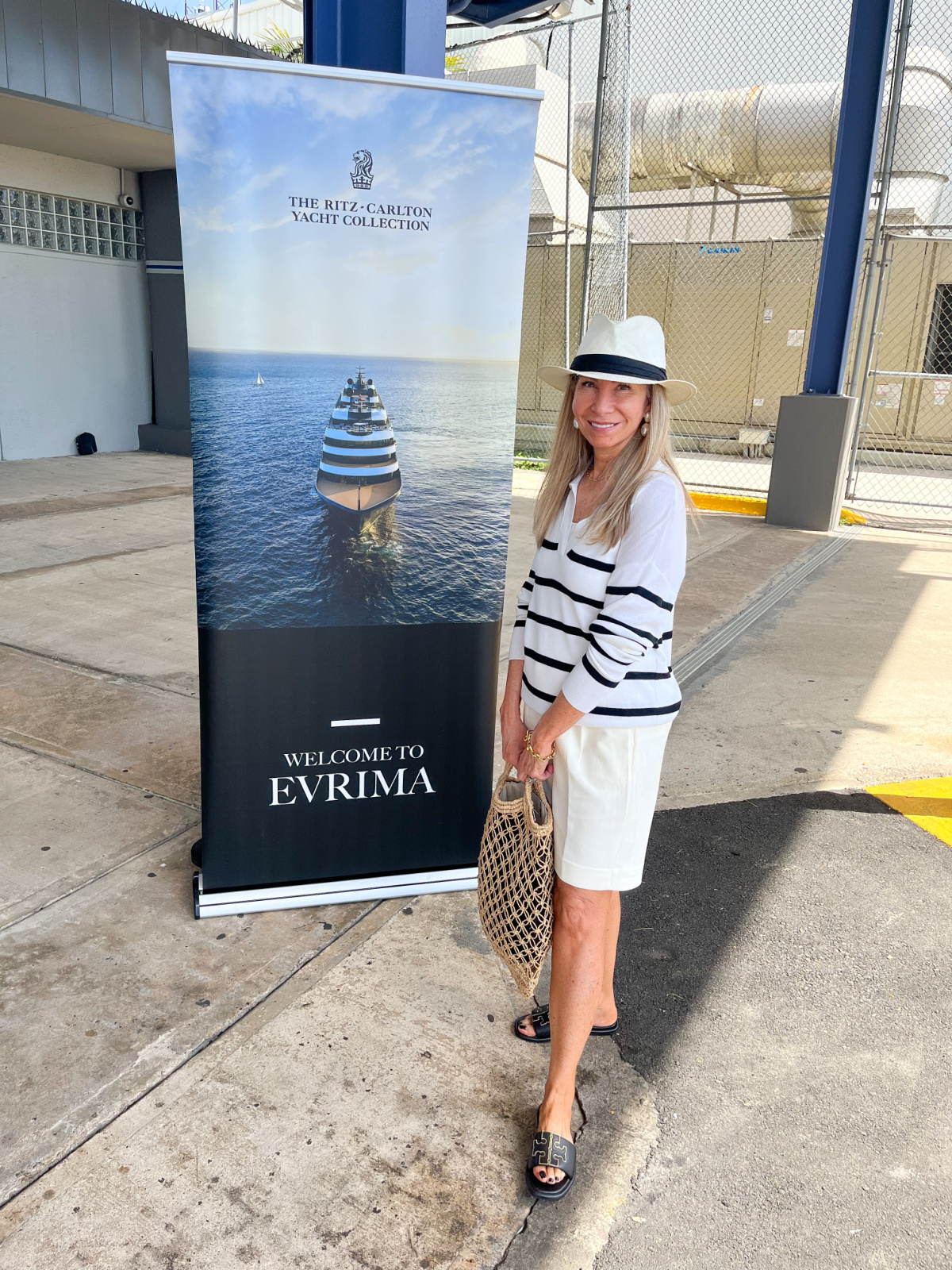 Woman about to board Ritz Carlton Yacht Collection cruise.