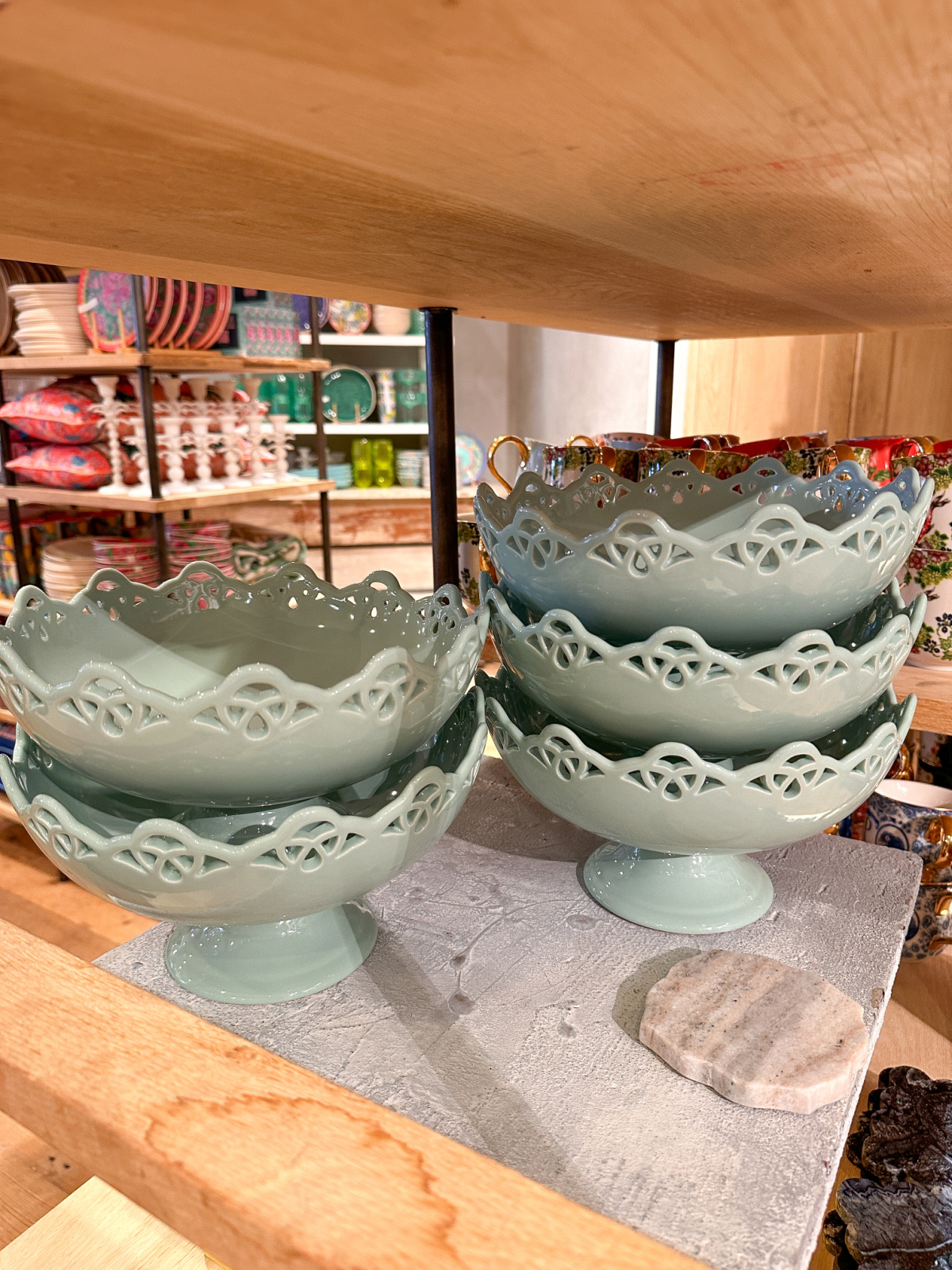 Blue compote bowls with lace like detail.
