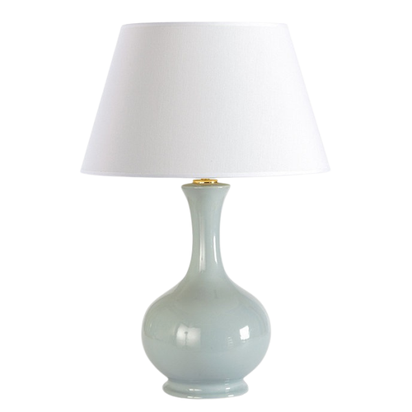 Pale blue lamp with white shade.